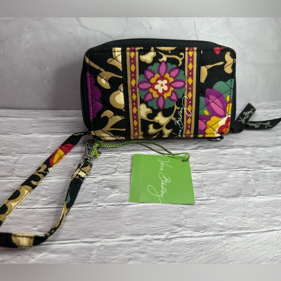 Vera Bradley Handbags - Vera Bradley Carry it all Wristlet Suzani NWT